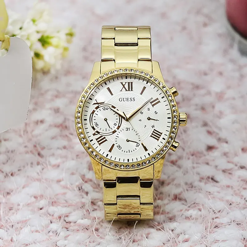 Guess Solar Crystal Silver Dial Gold-tone Ladies Watch- W1069L2